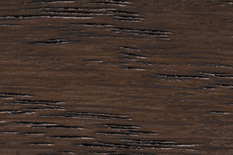 A close-up image of a dark brown wood stain.
